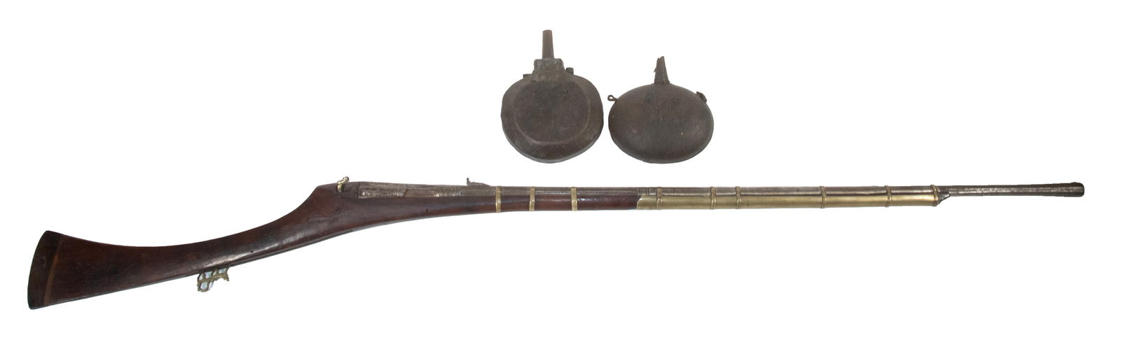 JEZAIL MATCHLOCK & (2) POWDER FLASKS: An offering of an ornate Jezail matchlock along with two leather formed Turkish powder flasks. The gun is exceptionally ornate with a finely forged and shaped barrel with a wide flared and ribbed cham