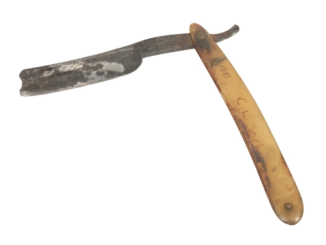 CIVIL WAR STRAIGHT RAZOR DATED 1861, MAINE SOLDIER: Sheffield Straight Razor with antler handle, with scratched inscription "1861, C.L. Wells, Maine", so soldier with initials 'CL' from Wells, Maine or soldier named 'CL Wells' from Maine.Rusted blade. 