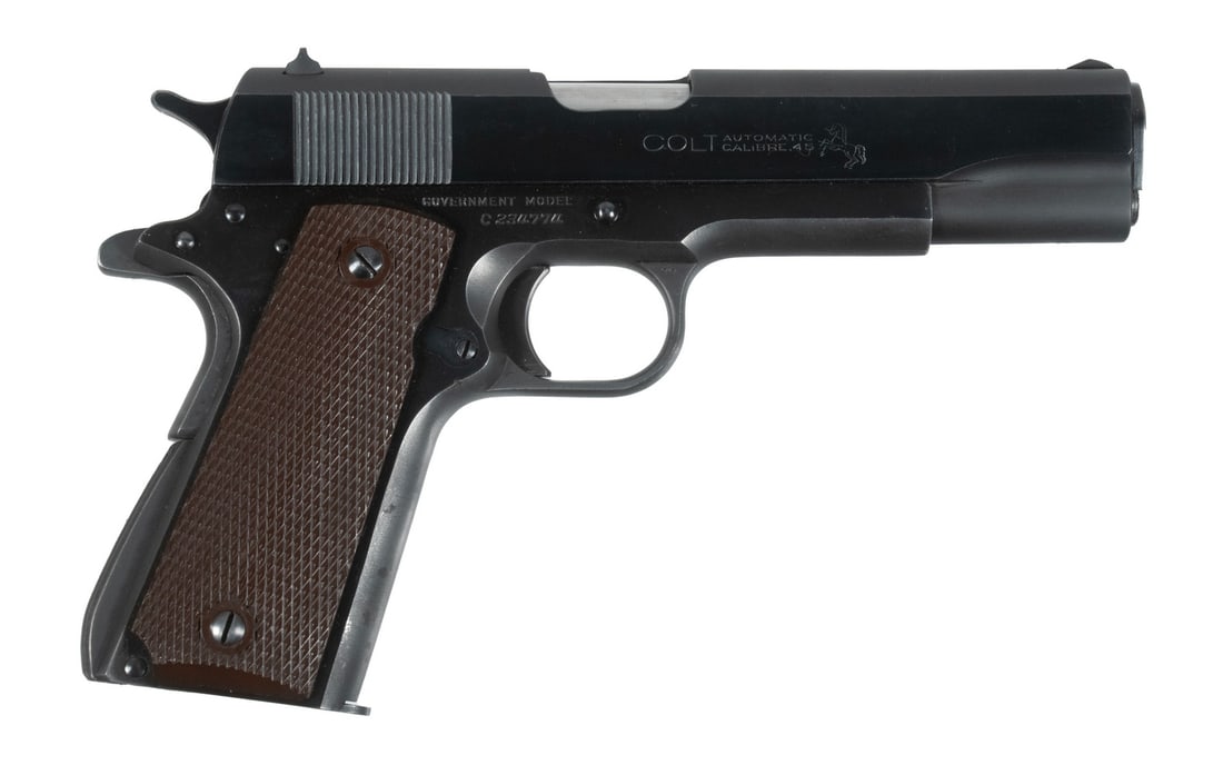 COLT GOV'T MODEL PISTOL, .45 ACP: An excellent offering of a post-war example of Colt's iconic semi-automatic. The pistol features a deep glossy-blued finish to the flat sides alongside a base matte finish with checkered plastic "Colt