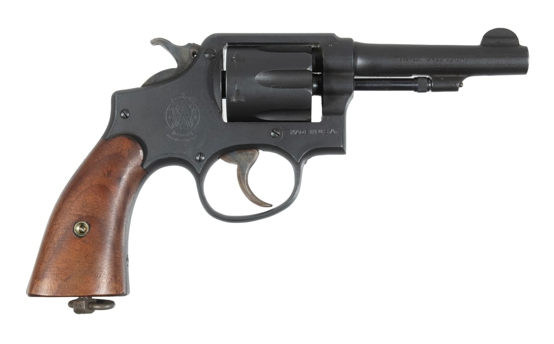 U.S. PROPERTY S&W VICTORY REVOLVER, .38 SPL: An excellent offering of the service revolver made by Smith & Wesson for the U.S. Navy and Marines. The gun features a gray parkerized finish to barrel, frame and cylinder with smooth wooden grip pane