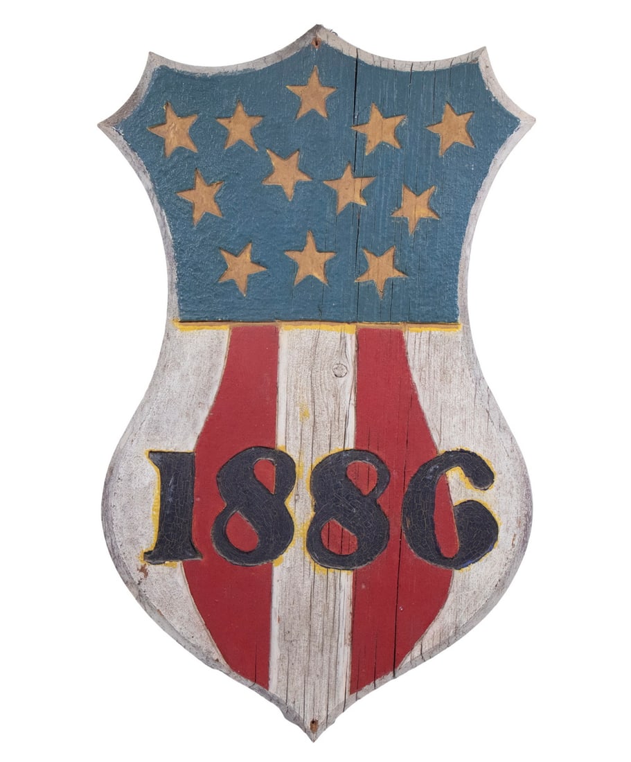 FOLK ART PATRIOTIC SHIELD FROM NEW BALTIMORE, NY: '1886' Painted Pine American Shield with shallow relief carved date and 12 (!) stars, taken off a barn in New Baltimore, Greene County, NY, on the Hudson River (currently about 3300 occupants), home o