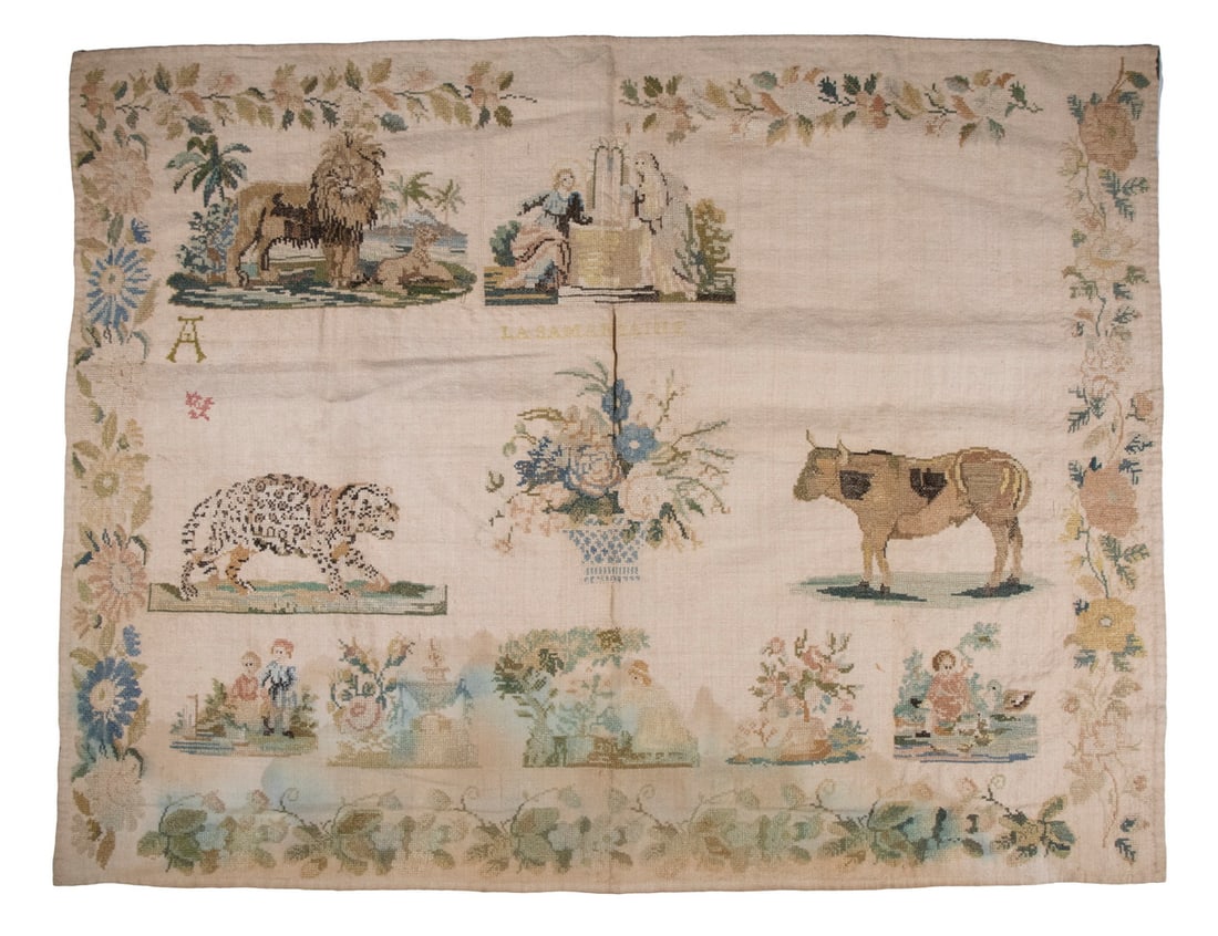 EARLY 19TH C. LARGE NEEDLEPOINT, UNFRAMED: Pictorial Sampler in silk on linen, having portraits of three animals (lion, leopard and bull), the fourth upper right panel is blank; centered on a floral basket with garden scenes along bottom, a fu