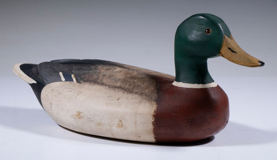 CARVED AND PAINTED MALLARD DECOY: Vintage Mallard Drake Decoy, branded TM on the base - probably for Wolfe Island, Ontario, Canada. Carver Tom Martindale, with glass eyes, 7" high, 16 1/2" x 6 1/2". Converted dimensions: 7 x 16 1/2 x