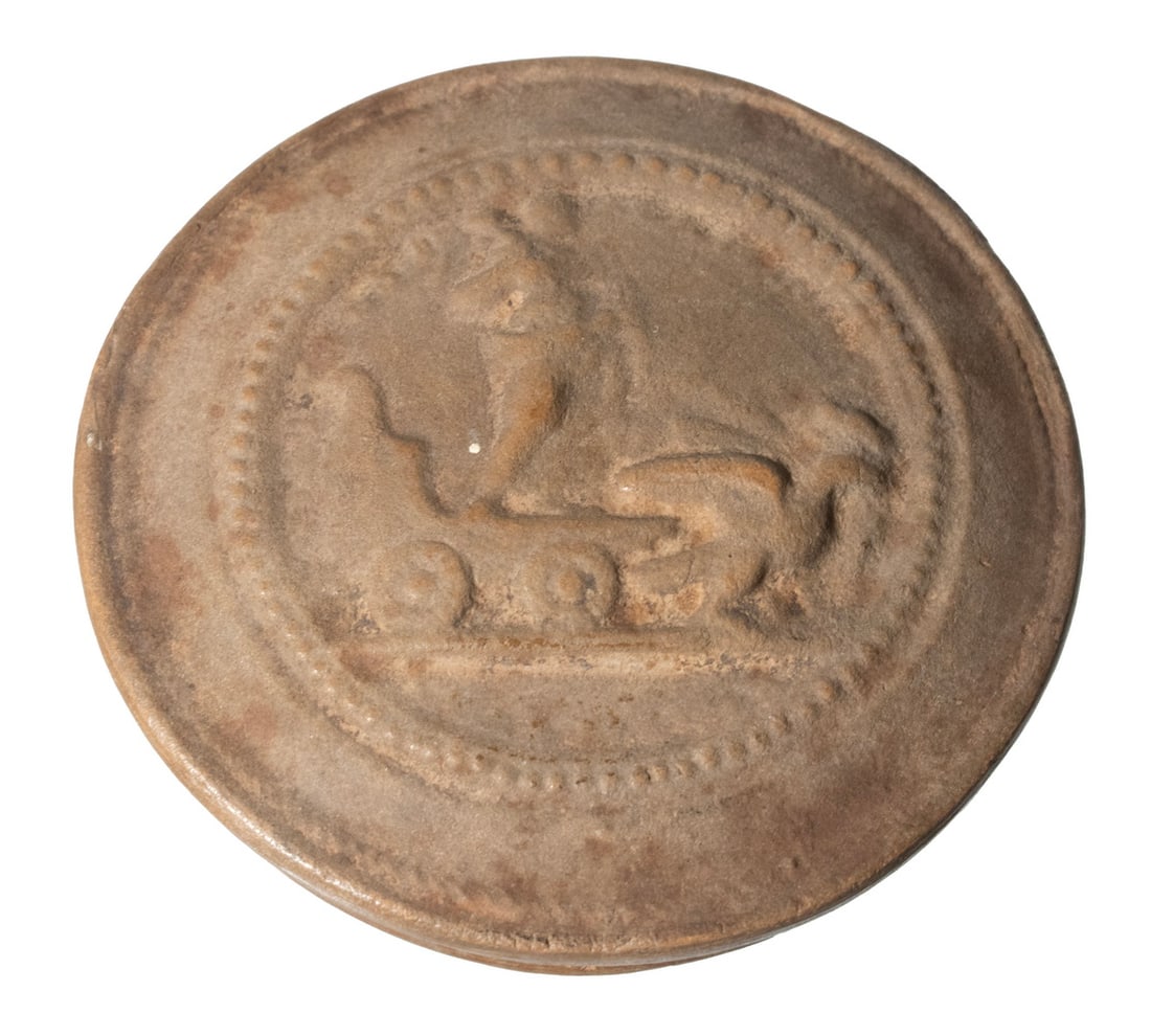 ANCIENT ROMAN POTTERY LIDDED SALVE JAR: Decorated with Jupiter Standing on Eagle Drawn Wagon on lid, sides of lower dish with repeating Fish (possibly an early Christian motif). Converted dimensions: 1 1/4 x 3 1/4 x 3 1/4 in. (3.2 x 8.3 x 8