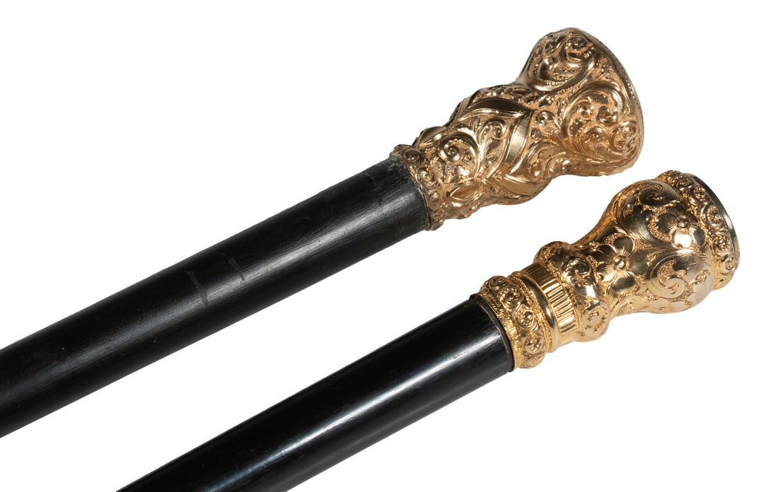 (2) GOLD FILLED BALL TOP WALKING STICKS: (2) Piece Collection of Early 20th c. Ebony Dress Sticks, incl: Cane with ornate gold filled ball top marked "W.J.B. & Co., Rolled Gold" (probably for W. J. Braitsch & Co., Providence, RI), with engra