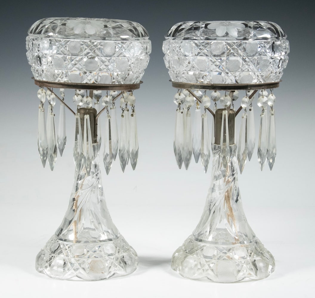 PR AMERICAN BRILLIANT CUT GLASS LAMPS WITH PRISMS: Pair of Electric Boudoir Lamps, ca. 1915, decorated with floral and cane cut motifs, having mushroom form shades with star design top, the shade supports lined with crystal drop prisms, set on flared 