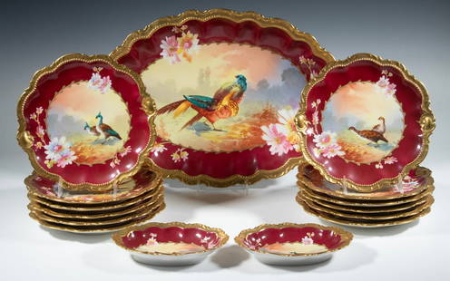 (15 PC) ARTIST SIGNED LIMOGES GAME SET: Early 20th c. French Porcelain Game Set, each piece with hand painted game bird decoration signed "Gyp", surrounded by deep burgundy ground edge and raised gilded rim, imported by George Borgfeldt & C