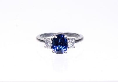 PLATINUM, SAPPHIRE AND DIAMOND LADIES RING