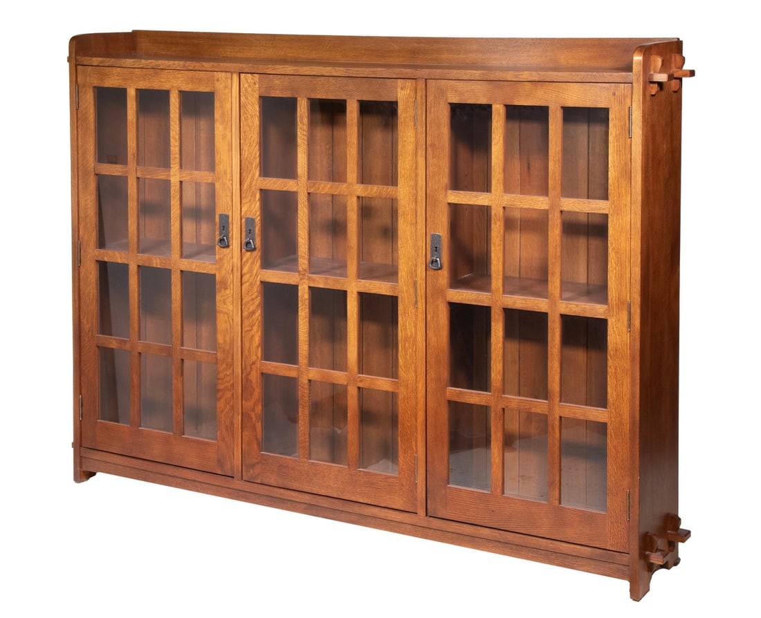 STICKLEY MISSION COLLECTION OAK CHINA CABINET: Custom Arts & Crafts Style Cabinet, by Stickley Furniture (Manlius, NY and Archdale, NC), #89-647, with top backsplash, three front doors - each with twelve glass panels and hammered copper pulls, eac