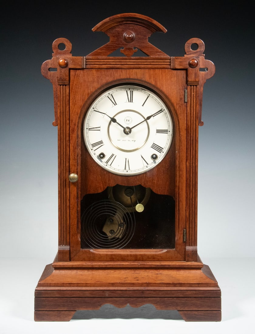 SETH THOMAS CITY SERIES - NORFOLK MANTEL CLOCK: Circa 1880 Walnut Cased Clock, a line with many models named after American cities, this one - the Norfolk model - having an 8-day time and strike movement (with manufacturer signed pendulum and key),