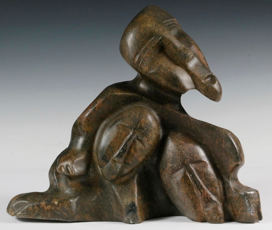 ALEX ALIKASHUAK (INUIT, WHALE COVE, NUNAVUT, CANADA, 1952 - ): Family in carved black and ochre speckled stone, unsigned, 11" x 12 1/4" x 7". Scuffs. Converted dimensions: 11 x 12 1/4 x 7 in. (27.9 x 31.1 x 17.8 cm.)
