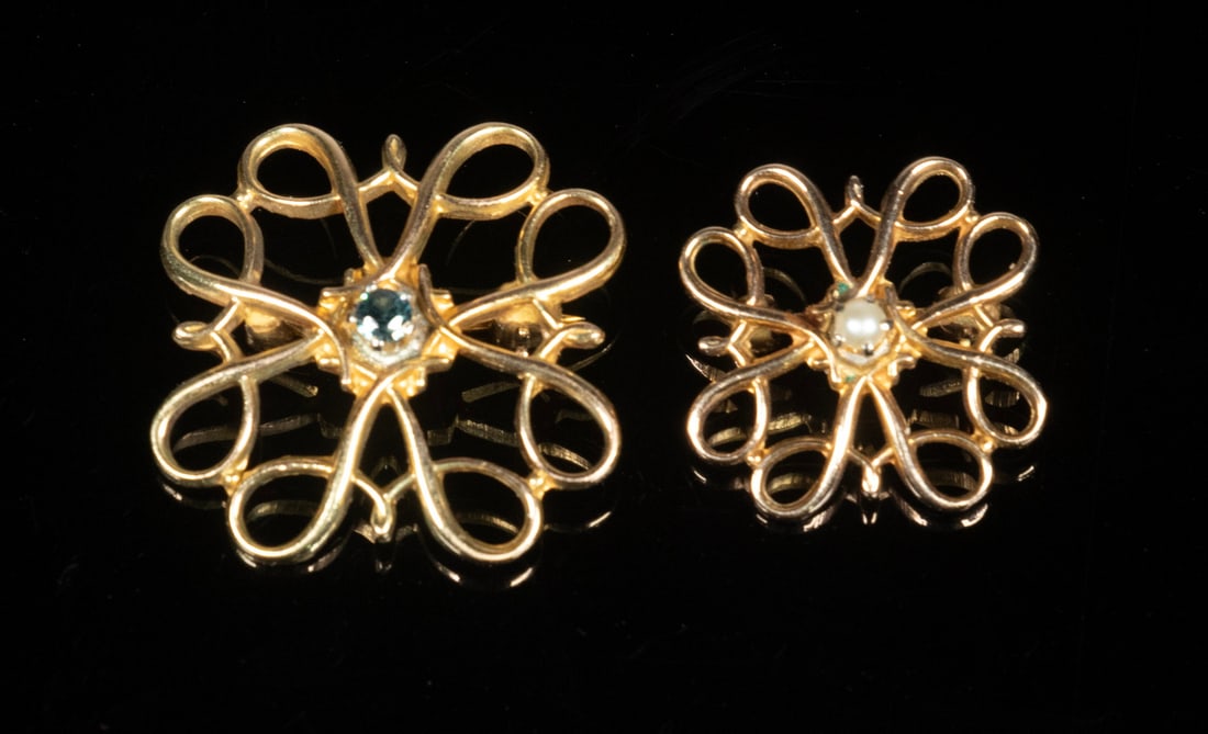 (2) VINTAGE 10K GOLD SCROLLWORK BROOCHES: Each designed in an openwork floral scroll motif, one centering a seed pearl and the other setting a blue spinel. Both marked “FIOK”. One 3/4" diam. Other 1". 2.3 dwt. tw. Good condition. 