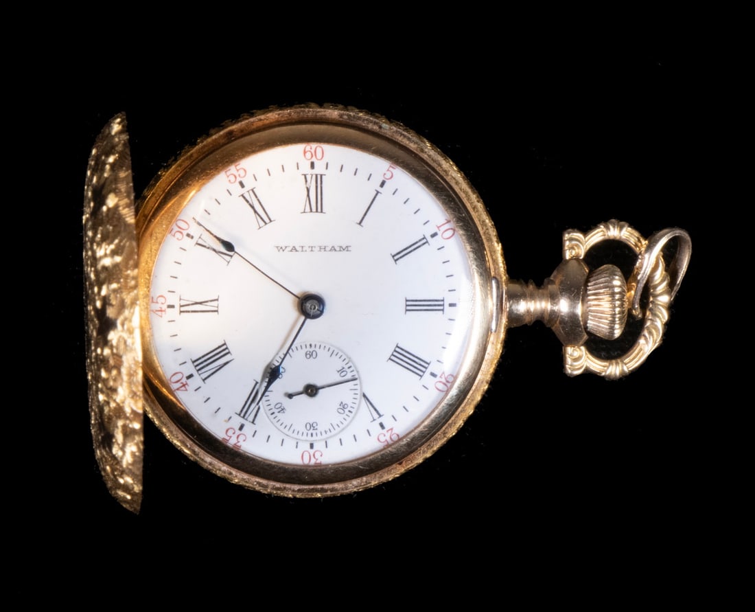 14K GOLD POCKET WATCH PENDANT: Overall filigree patten with stars and central monogram, "AMK". Overall hight: 2"; 1 3/8" diam. Dimensions
