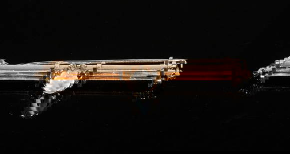 VICTORIAN 14K GOLD MOONSTONE BAR BROOCH: An elegant bar brooch crafted in 14K yellow gold, featuring a domed moonstone cabochon at center, framed by double bar rails and geometric terminals. 2 1/4" length, 3.0 dwt, tw. Good condition. Dimens