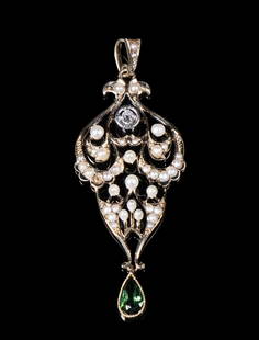 ANTIQUE 14K GOLD, DIAMOND AND PERIDOT PENDANT: Delicately crafted in 14K gold, this openwork pendant features seed pearls, old cut diamonds, and a pear-cut peridot drop.1.7 dwt. tw. Missing one pearl, overall good condition. Dimensions 2 x 0 3/4 i