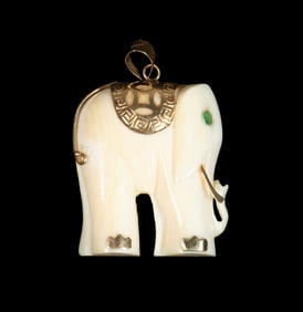 14K GOLD AND CARVED ELEPHANT PENDANT
