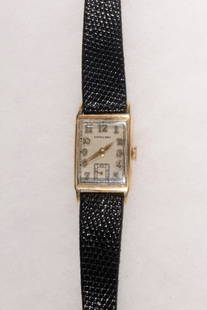 14K YELLOW GOLD GENT'S WRISTWATCH, HAMILTON: Vintage Hamilton Tank Form Wristwatch with 14K yellow gold square head, gold stamp to case back, engraved "from BECIE Dec 25, 1939". Recently serviced with black genuine lizard band. Dimensions
