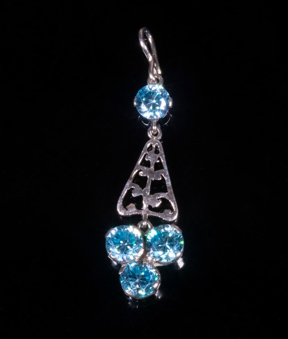 14K WHITE GOLD BLUE ZIRCON OLD PENDANT: Set with (4) round stone. 2" long. Dimensions Length: 2 in. (5.1 cm.)
