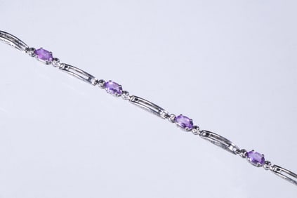 DESIGNER 10K GOLD AND AMETHYST BRACELET