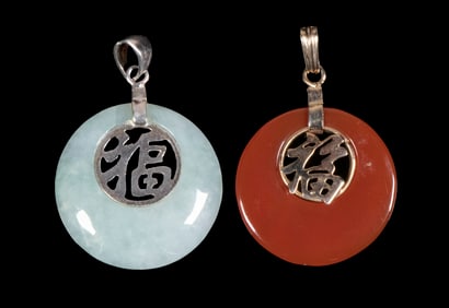(2) CHINESE JADEITE AND CARNELIAN PENDANTS