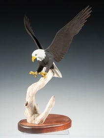 WENDELL JONES-HAND-CARVED BALD EAGLE SCULPTURE ATOP DRIFTWOOD BASE