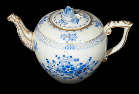 HEREND PORCELAIN TEAPOT: Petite Hungarian Porcelain Lidded Teapot, with embossed basketweave shoulder and hand painted blue and gilded decoration, blue rose design lid finial, gilt decorated handle and spout.From the estate o