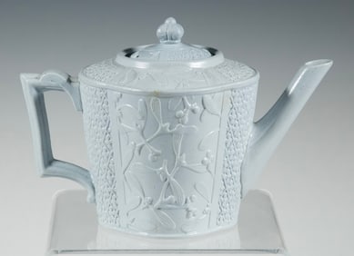 VICTORIAN WHITE RELIEF-MOLDED “MISTLETOE” TEAPOT, WILLIAM BROWNFIELD & SON, ENGLAND