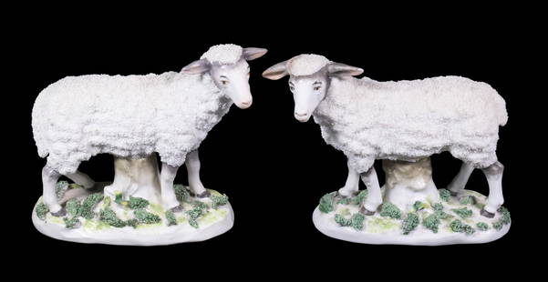 PR PORCELAIN SHEEP FIGURINES: Pair of Antique Chelsea Style Standing Sheep, atop grass encrusted bases, with painted gold anchor mark. One with re-attached ear.From the estate of Brooke Astor at her summer residence in Northeast H