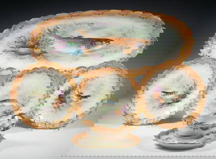 (12) FRANCE LIMOGES FISH SERVICE PLATES, SIGNED: A fine set of (12) hand-painted porcelain plates, including (1) large oval fish platter, (10) dinner plates, and (1) attached sauce boat with underplate. Each features a delicately rendered fish motif