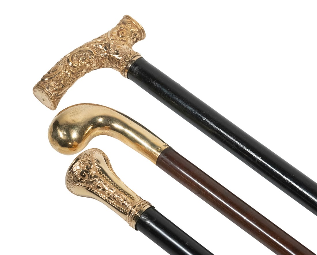 (3) WALKING STICKS WITH GOLD FILLED TOPS: Group of (3) Late 19th - Early 20th c. Dress Canes, incl: Ebony stick with fancy top by Simons Brothers Co. (Philadelphia), engraved "Joseph Mitchell, 1883", also stamped S in shield mark with "2", 32