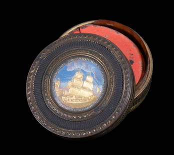 FRENCH ENAMEL AND BRASS SNUFF OR PATCH BOX WITH SHIP SCENE, MID-19TH CENTURY: Of circular form, the lid is finely decorated with a polychrome enamel medallion depicting a tall-masted sailing ship near shore under a blue sky, framed within a patterned guilloch&#233;-style ground