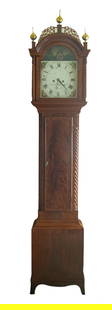 AARON WILLARD, JR. BOSTON TALL CASE CLOCK W/ ROCKING SHIP MOVEMENT: Carved fretwork crest with three brass finials. The central door is flanked by two carved and rope-turned columns. The throat has a figured mahogany door flanked on either side by rope-turned quarter-