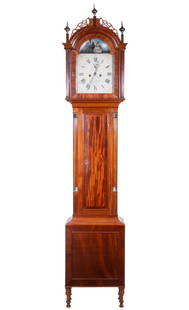 GRANDFATHER CLOCK BY JOSHUA: Circa 1810 Finest Quality Tall Clock in Chippendale flame mahogany case, the bonnet with molded arched pediment having reticulated fence with three brass steeple finials. The painted steel dial signed
