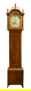 TALL CLOCK BY BENJAMIN MEAD, WISCASSET. MAINE: Signed Cherry Case Chippendale, with filigree bonnet having brass finials and full round columns with brass fittings, four day time and strike brass works, painted steel dial with rose brackets, moon