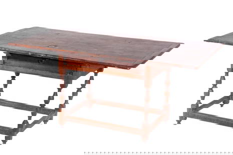 EARLY 18TH C. LARGE TAVERN TABLE W/ DRAWER: Has a ring in the vase, turned legs with a box stretcher base. Single plank top breadboard ends. The base is hardwood, the top is pine. In a very old refinished surface with minor old repairs.From the