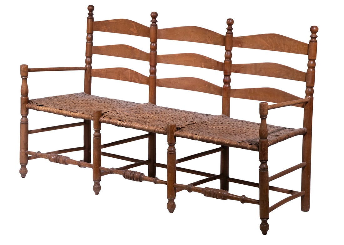 PENNSYLVANIA LADDER BACK SETTEE: Rare 18th Triple Seat Settee, with turned posts, splint woven seat, set on eight legs, seat splint losses.From the estate of Linda Bean. OS: 36 x 53 x 18 1/2 in. (91.4 x 134.6 x 47 cm.)