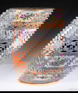 CHINESE EXPORT PORCELAIN GARDEN SEAT: Vintage Barrel Form Famille Rose Porcelain Garden Stool, with pierced lucky coin decoration and two rows of raised bosses, the surface with paneled figural and floral decoration surrounded by images o