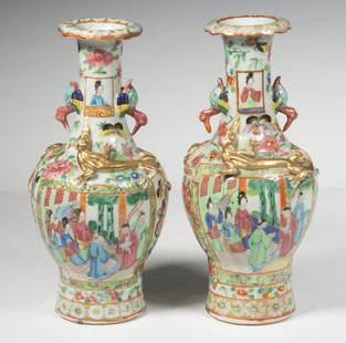 PR CHINESE CANTON ROSE MEDALLION VASES, 19TH CENTURY: Pair of 19th c. Export Porcelain Baluster Vases, with scalloped floral painted rims, duck form side handles, applied gilded chilongs to shoulder, paneled figural and flower basket decoration to body,