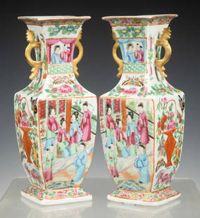 PR CHINESE ROSE MANDARIN VASES, 19TH CENTURY: Pair of 19th c. Export Porcelain Vases, square form with flared rim and tapered body, gilded side handles, the fronts and backs with familial scene figural decoration, the sides with flower basket and
