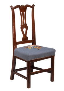 CHIPPENDALE YOKE-BACK SIDE CHAIR: 18th c. Mahogany Side Chair, with shaped crest, pierced back splat, floral needlepoint seat, set on square legs with stretchers, 40 1/2" high, 19 1/2" x 17", 18 1/2" high seat.From the Estate of Bowdo