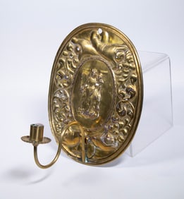 EARLY BRASS REPOUSSE CANDLE SCONCE