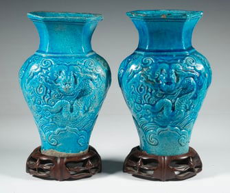 PR CHINESE TURQUOISE-GLAZED DRAGON VASES WITH HARDWOOD STANDS