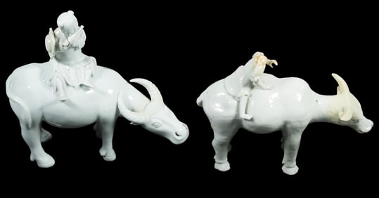(2) CHINESE DEHUA PORCELAIN FIGURES - BOYS ATOP WATER BUFFALO