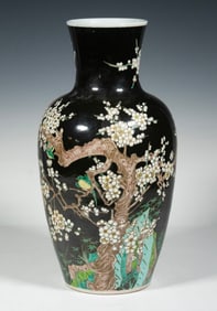 CHINESE FAMILLE NOIRE VASE WITH PLUM BLOSSOMS AND BIRDS