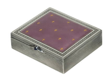 FRENCH SILVER GUILLOCHE ENAMEL BOX WITH SAPPHIRE CABOCHON CLASP: A fine French silver box with lavender guilloche enamel lid, decorated with scattered gilt fleur-de-lis motifs over an engine-turned ground, within a foliate-engraved silver border. Fitted with a blue