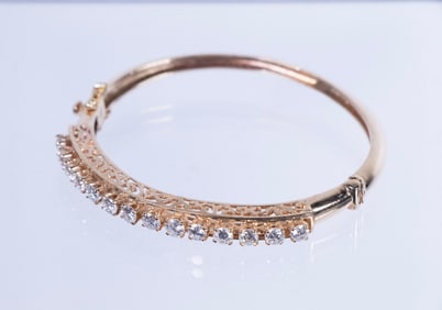 14K LADIES BANGLE BRACELET WITH DIAMONDS