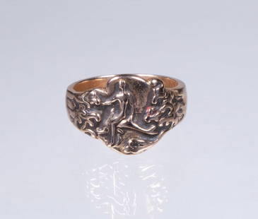 VINTAGE 18K GOLD FIGURAL MEN'S RING: An 18K Gold men&#8217;s ring featuring a figural design of a woman riding dolphin amid stylized waves; 9.7 dwt. tw. Overall in good condition. Ring size:11 1/2