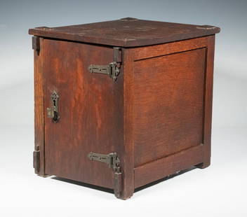 MISSION OAK ARTS & CRAFTS CIGAR HUMIDOR: Circa 1900 Dark Quarter Sawn Oak Cabinet with hinged door on decorative hinges, ceramic lined with moisture brick in bottom, wavy wire grid, lock (but no key), mortise and tenon construction, pyramid