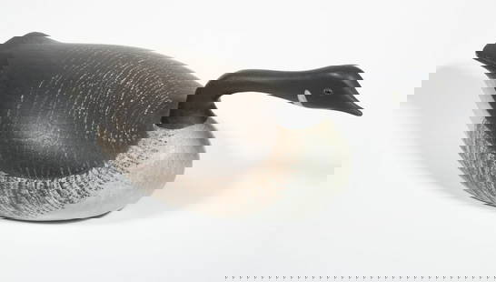 QUARTER-SIZED CANADA HISSING GOOSE DECOY BY JOSEPH LINCOLN: Joe Lincoln Display Decoy of a Hissing Goose, stamped on underside "Joe Lincoln, Accord, Massachusetts". Professional old, Repair to neck. 13 1/2 in. (34.3 cm.)