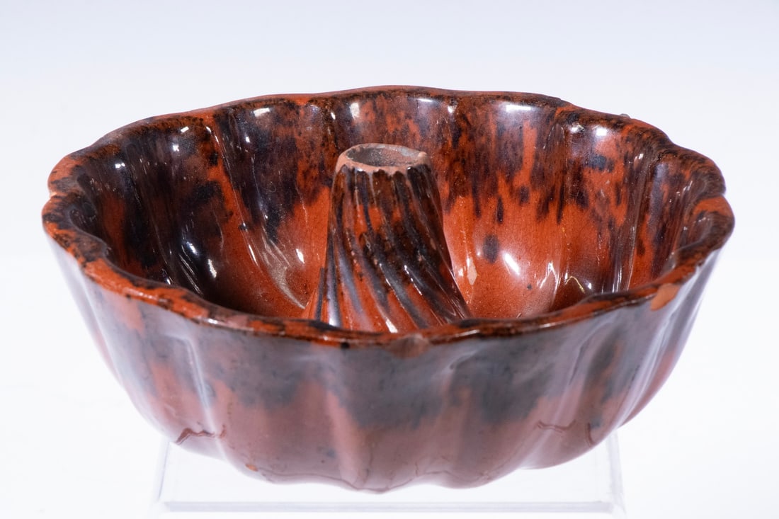 AMERICAN REDWARE RING MOLD WITH DARK MOTTLED GLAZE, 19TH CENTURY (1 of 3)